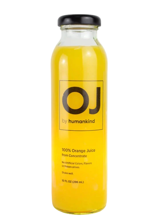 Bottle of orange juice with 'OJ by humankind' label on a white background